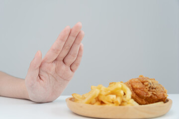 Beauty slim female body confuse fat food. Woman in restaurant achieves weight loss goal for healthy life, low calorie, thin waist, nutritionist. Diet, body shape, balance control, avoid, nutritional.