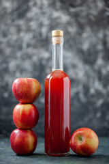 front view apple sauce red colored with fresh apples on gray background color fruit drink sauce...