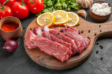 front close view fresh red tomatoes with greens and seasonings on dark background meal dinner meat animal food butcher salad barbecue