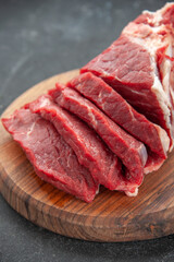 front view fresh sliced meat on a dark background butcher meal animal meat barbecue color dinner food