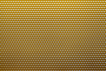 Background texture and pattern of section voshchina of wax honeycomb from a bee hive for filled with honey. Voshchina an artificial basis for the construction of honeycombs, sheet of wax of cells