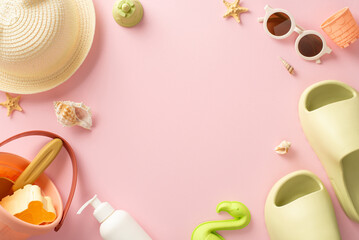 Top view photo capturing the essence of a summer trip with children, featuring marine shells, sand molds for sandcastle, panama hat, slippers and sunglasses on pink isolated background with copy-space