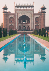 Picture of the gateway of the Taj Mahal with its reflection in Water showing the beautiful...