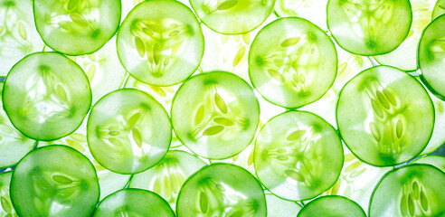 macro sliced cucumber,Two fresh cucumbers on the background,fresh cucumber slices background