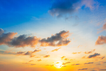 Naklejka premium Clouds and orange sky,panoramic sunset sky and clouds background