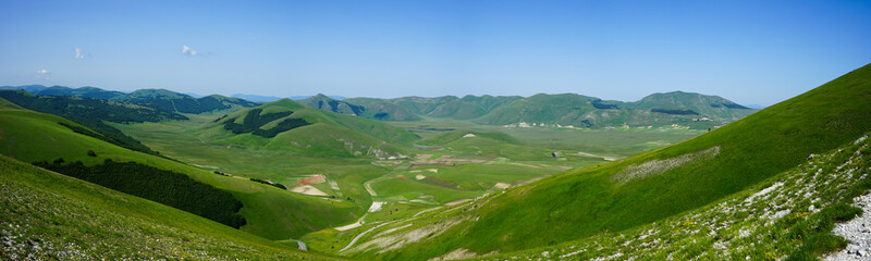 Fototapeta na wymiar Castelluccio valley view in a summer day, Norcia, Sibillini National Park, Umbria, Italy