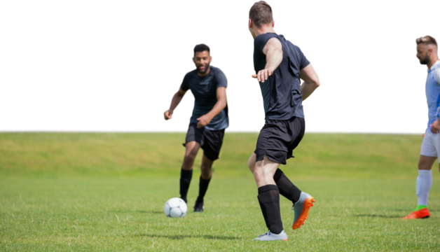 Digital png photo of diverse footballers during match on transparent background