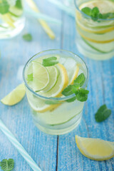 Glasses with lemon and lime lemonade