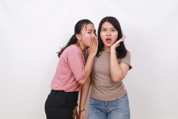 Asian woman talk about something with her friends. Gossip concept. Isolated on white