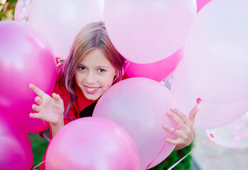 Close-up portrait attractive cute cheerful cheery girl helium balls