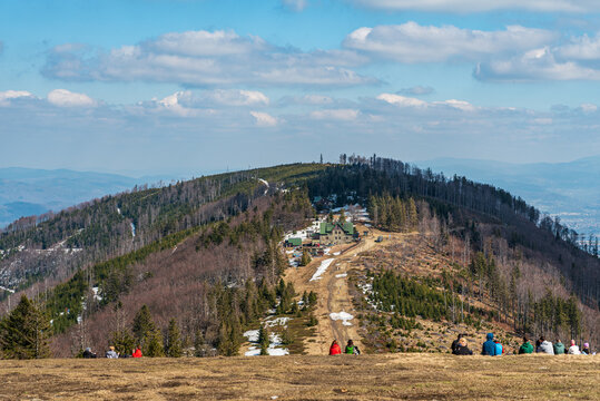 Schronisko na Klimczoku with Magura hill above from Klimczok hill summit in Beskid Slaski mountains in Poland