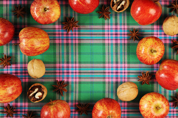 Bright ripe apples forming autumn mood background for design and decoration