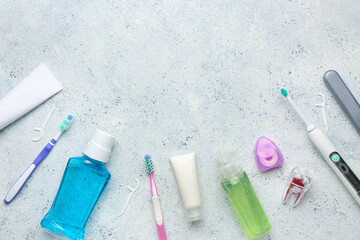 Supplies for oral hygiene on white background