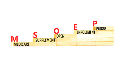 MSOEP symbol. Concept words MSOEP medicare supplement open enrollment period on wooden block....