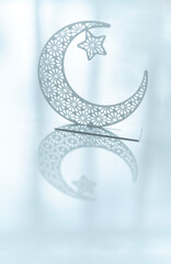Simple Ramadan Kareem background, Minimal type Eid Al Adha greetings image white crescent moon shape with reflections