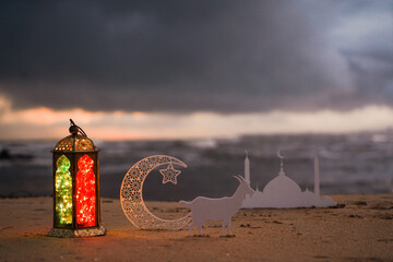 Islamic concept photography Colourful Lantern lamp with crescent moon and mosque on the background