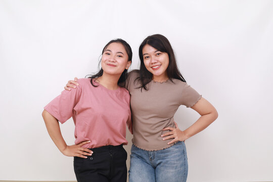 Close up photo of cute charming ladies fellows fellowship standing against white background