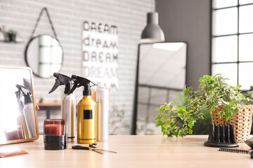 Hairdressing tools on table in beauty salon