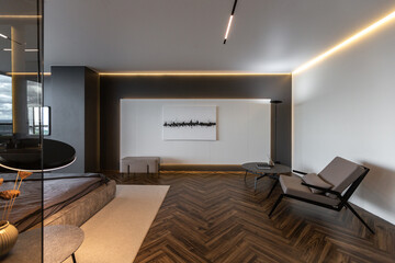 cool expensive interior design of room in prestigious luxury hotel with dark tones with modern LED...