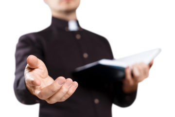 Young priest reading the Holy Bible and stretching his hand, cut out