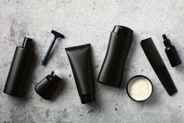 Set of male skin care beauty products on stone table. SPA cosmetics for men design, branding.