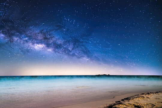 beautiful night sky in a tropical beach in the shores of the ocean, with the milkyway, made with ai generative tools © AlessandroDellaTorre