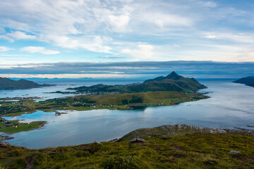 Fototapeta na wymiar Beautiful landscape of the Lofoten Islands during the golden hour, view from Offersoy Mount trail, Norway