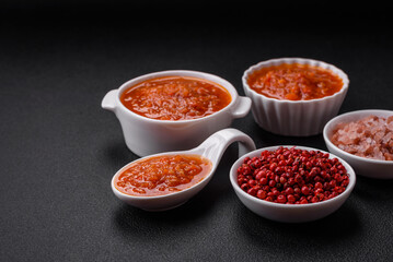 Delicious spicy tomato sauce with pepper, garlic, salt, spices and herbs
