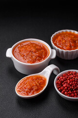 Delicious spicy tomato sauce with pepper, garlic, salt, spices and herbs