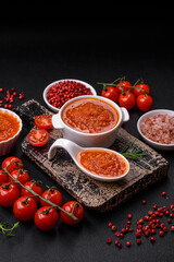 Delicious spicy tomato sauce with pepper, garlic, salt, spices and herbs