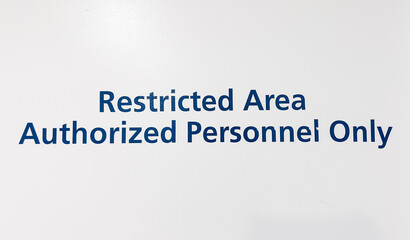 Authorized Personnel Only' restricts access, conveying exclusivity, safety, and confidentiality in a limited area