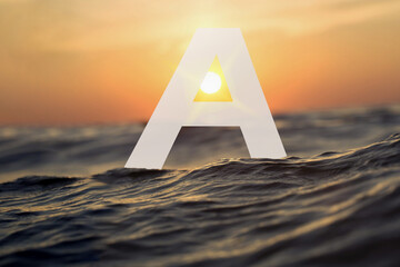 Discover a spellbinding sight as the letter "A" finds its aquatic home in the depths of the ocean. Bathed in a radiant underwater glow, this elegant symbol stands gracefully, embraced by vibrant Marin