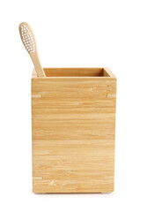 Bamboo tooth brush in holder on white background