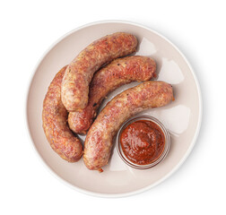 Plate of tasty homemade sausages with sauce isolated on background