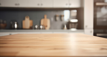 Beautiful wood table top with blur bokeh modern kitchen interior