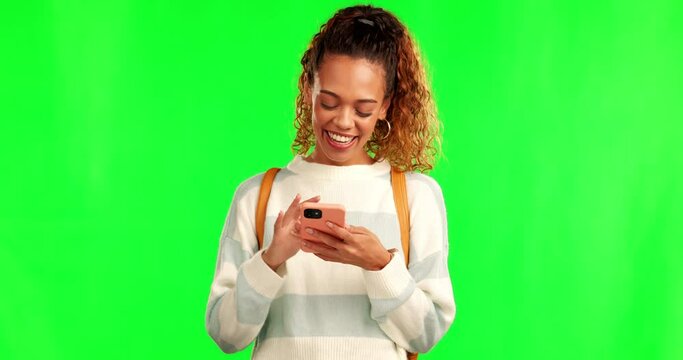 Happy woman, typing and laughing with phone on green screen for joke or meme against a studio background. Female person smile and laugh on mobile smartphone for funny chat, texting or social media