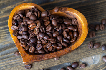 Roasted and fragrant coffee beans on the table