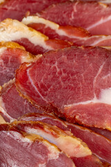 dried red pork meat on the kitchen table