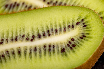 Ripe soft green kiwi with black seeds