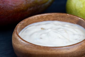 fresh milk yogurt with mango slices, bio yogurt