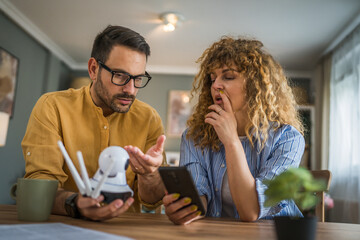 Couple at home connect and install cctv security surveillance camera