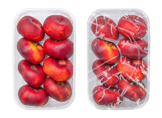 fruit nectarine in plastic box on white background - 615264552