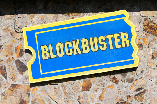 Bend, OR, USA - June 16, 2023; Logo sign on last Blockbuster location wall in Bend Oregon