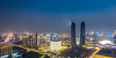 Fototapeta na wymiar Aerial photography of night view of Hangzhou Gate, Hangzhou Century Center, Hangzhou, Zhejiang, China