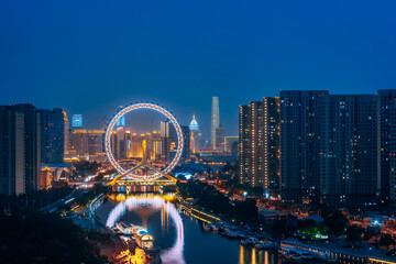 High angle view night view of Tianjin Eye ferris wheel in Tianjin, China