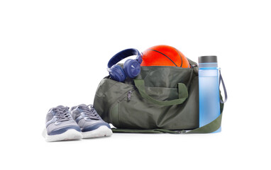 Gym bag with sports equipment on white background