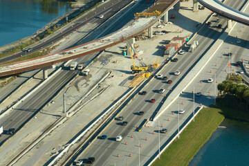 Industrial roadworks in Miami, Florida. Wide american highway junction under construction. Development of interstate transportation system for rapid transit for long distance travelling