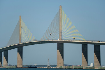 Sunshine Skyway Bridge over Tampa Bay in Florida with moving traffic. Concept of transportation infrastructure