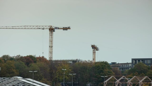 day time munich city construction yard cranes panorama 4k timelapse germany