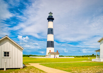 A nice landscape of the historical Bodie Island Lighthouse by the keeper's quarters on the Outer Banks of North Carolina.